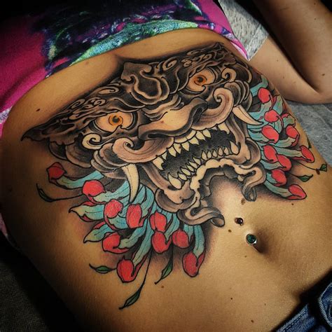 large stomach tattoos for women.